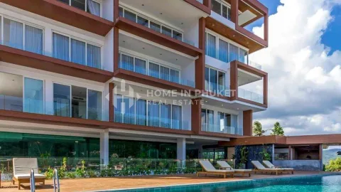 Q Conzept Condominium — кондоминиум рядом с пляжами Ката и Карон — интерьер жилого пространства