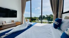 Ocean Hills Phuket — спальня или приватная зона