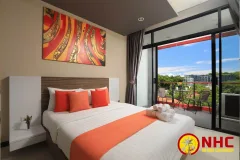 Nai Harn Beach Condominium — Най Харн Бич Кондоминиум — спальня или приватная зона